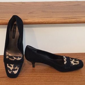 Bandolino black suede pumps with leopard trim.